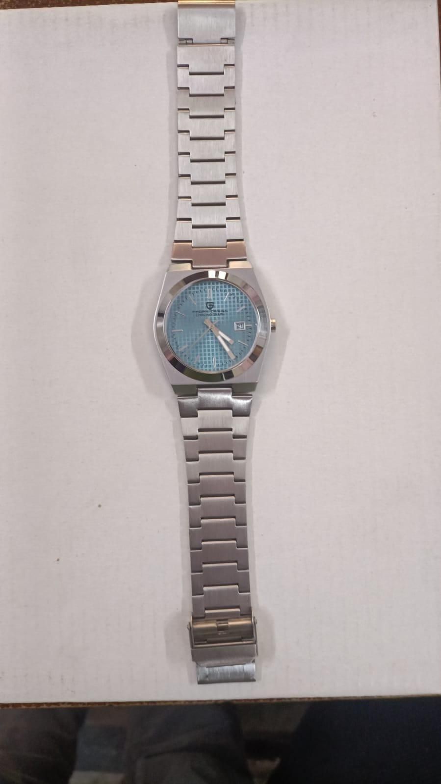 Luxury Pagani Design Stainless Steel Watch Aqua Blue Textured Dial on a white background.